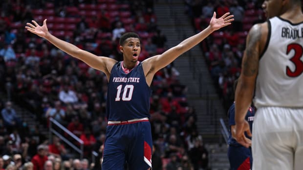 Fresno State Bulldogs forward Orlando Robinson (10) reacts after an offensive goaltending call on the Bulldogs during the second overtime against the San Diego State Aztecs at Viejas Arena.
